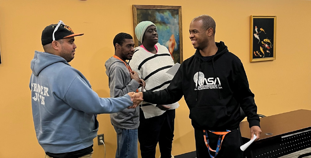 service advisory council members shaking hands